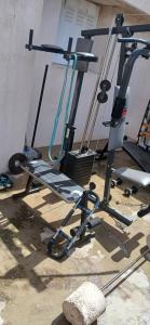 a gym with two treadmills and a treadmill at tamzain24 in Marseille