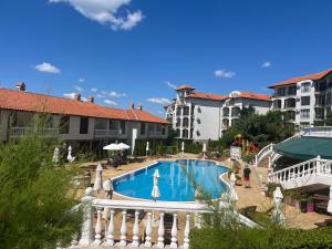 a view of a swimming pool in a resort at Triumph Fantastic View in Sveti Vlas