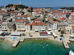 an aerial view of a town on the water at Apartment Dane in Primošten