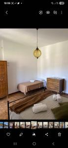 a bedroom with two beds in a room at Casa Vacanze Alba in Pianillo