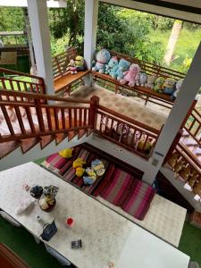 an overhead view of a room with stuffed animals at น่านสุขโข โฮมสเตย์ in Ban Na Tho