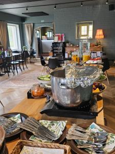 a table with a bowl of food on top of it at Villa Korsman in Hanko +35 photos