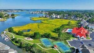 an aerial view of a house on an island in the water at Spacious Resort Villa Near Beach - VBBL in Ocean View