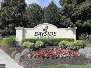 a sign for a bayridge building with flowers at Spacious Resort Villa Near Beach - VBBL in Ocean View