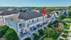 an aerial view of a large house with a red marker at Spacious Resort Villa Near Beach - VBBL in Ocean View +37 photos