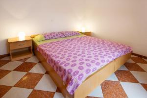 Postel nebo postele na pokoji v ubytování Apartments AVA