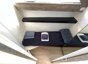 an overhead view of a bunk bed in a room at BED&BOAT II boatandholiday com in Fano