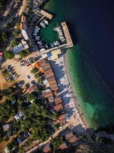 an overhead view of a beach with a marina and boats at Apartman sa suncem in Beli