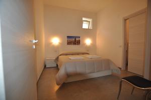 Postel nebo postele na pokoji v ubytování Affittacamere Da Mary