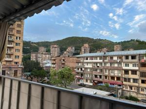 a view from a balcony of a city with buildings at Kapan Guesthouse in Kapan