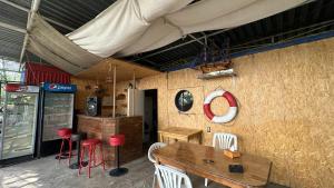 a restaurant with a table and chairs and a tent at Voyage in Sevan