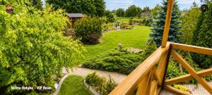 an overhead view of a garden from a balcony at Vilimu Sodyba - VIP Room in Kriukai