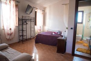 Giường trong phòng chung tại Il Casaletto del Terminillo