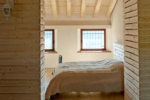 מיטה או מיטות בחדר ב-Agrigrà