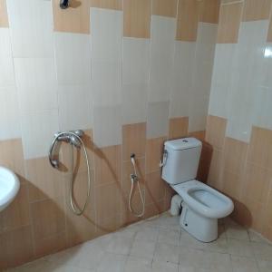 a bathroom with a toilet and a shower at Location Kelibia in Kelibia