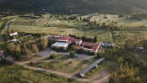 an aerial view of a large house in a field at Sant Efisio in Lotzorai