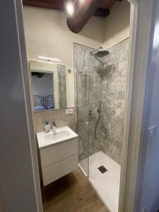 a bathroom with a shower and a sink and a shower at Agriturismo Podere La Casaccia in Poppi