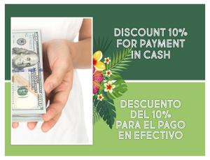 a hand holding a dollar bill next to a collage at FIESTA LOS CORALES - VILLAS and SUITES in Punta Cana