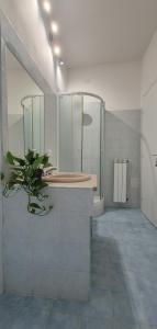 a bathroom with a sink and a mirror at Pisa tower view 2 in Pisa