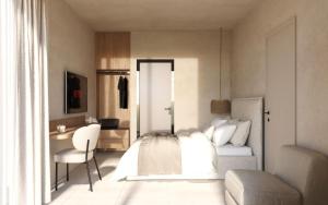 a bedroom with a bed and a desk and a chair at Haus Platanos Apartments & Bungalows by the Sea in Vourvourou