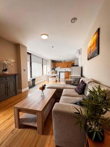 a living room with a couch and a table at The Ambassador Apartment in Carrick on Shannon