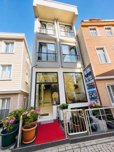 a building with a red carpet in front of it at Hagia Sophia Palace Hotel in Istanbul
