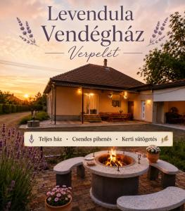 a garden with a fire pit in front of a house at Levendula Vendégház in Verpelét