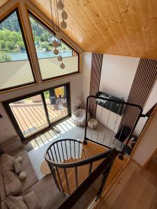 an overhead view of a living room with a chair at Stodoła Nad Dunajcem in Sromowce Wyżne