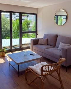 a living room with a couch and a table at Canto de la Perdiz in Villafranca del Bierzo +53 photos