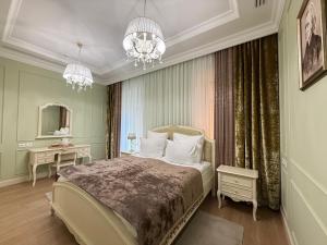 Llit o llits en una habitació de Leon Boutique Hotel