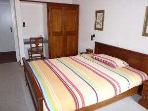 Letto o letti in una camera di Osteria Ticino by Ketty & Tommy