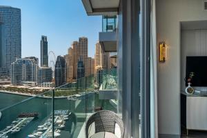 a balcony with a view of a city skyline at Luxurious Studio Marina View Condor Marina Star in Dubai
