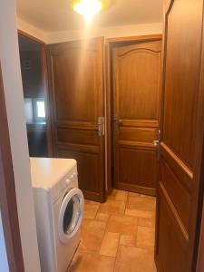 a laundry room with a washer and dryer at Villa LA BELLE ETOILE in Étoile-sur-Rhône