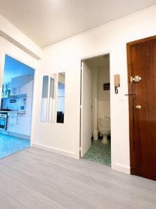 an empty room with a toilet and a door at Champs elysees apartment 4 in Paris +10 photos