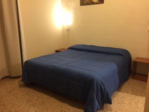 A bed or beds in a room at Affittacamere Euro