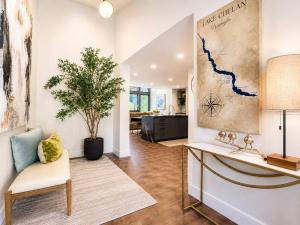 a living room with a couch and a table at Designer Lakefront Condo E3 Wapato Point Chelan in Manson +61 photos