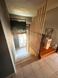 a room with a staircase with a stair railing and a stair case at Signature events in Malečnik