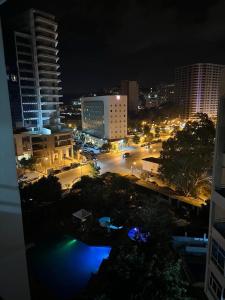 a view of a city at night at la corniche de tanger in Tangier