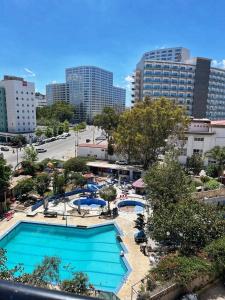 a view of a swimming pool in a city at la corniche de tanger in Tangier