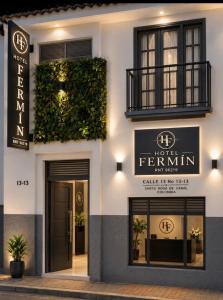a store front of a hotel fernium inn at Hotel Fermín in Santa Rosa de Cabal
