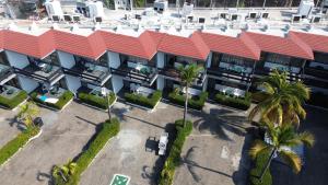 an aerial view of a building with a red roof at Hotel Bali-Hai Acapulco in Acapulco