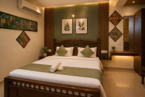 a bedroom with a large bed in a room at Rumis Jaisalmer in Jaisalmer