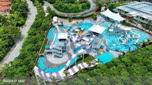 an overhead view of a pool at a resort at Vaperse Hainan Clear Water Bay in Lingshui