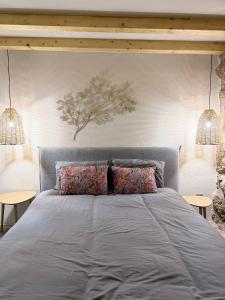 a bedroom with a large bed with two tables at Pedacinho do Céu in Vieira do Minho +24 photos