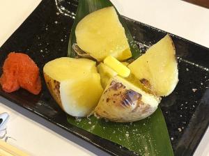 a black plate of food with meat and vegetables at Yuuzuru in Ito +29 photos