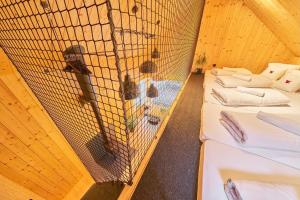 an overhead view of a bird in a cage at Glamping KOLBENKA in Horní Malá Úpa