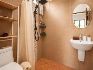 a bathroom with a toilet and a sink and a mirror at Casa Eden - Double King Bed - Peaceful Garden Retreat - 4K SmartTV in Thong Sala +26 photos
