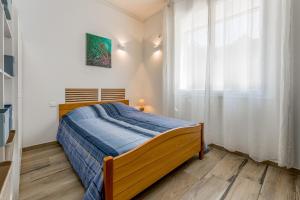 a bedroom with a bed and a window at Studio piscine Alpilles in Noves +14 photos