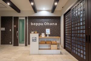 a store front with a sign on a brick wall at Beppu Ohana in Beppu +31 photos