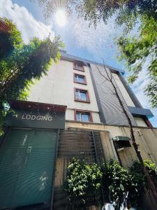 a building with a staircase in front of a building at Pancharatna Regency in Chinchwad